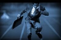man jumping hurdles